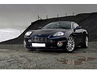 Taulu SPORTS CAR UNDER STORM CLOUDS