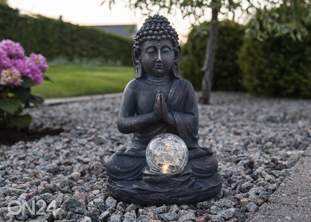 Pihakoriste aurinkokennolla Buddha kuvasuurennos