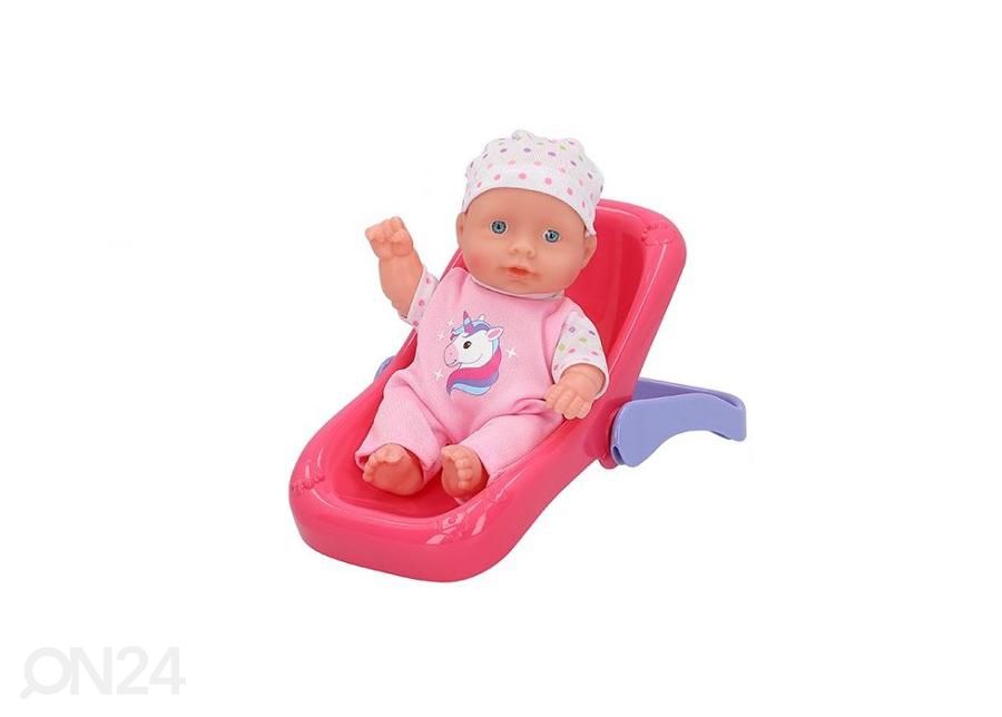 Nukke turvakaukalossa 20 cm kuvasuurennos