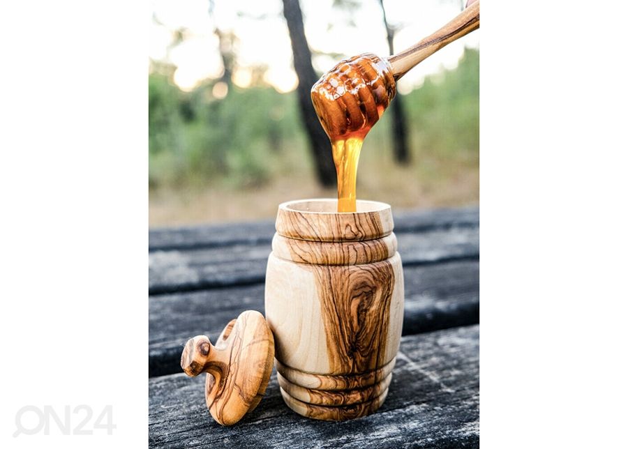 Oliivipuinen hunaja-astia ja lusikka kuvasuurennos