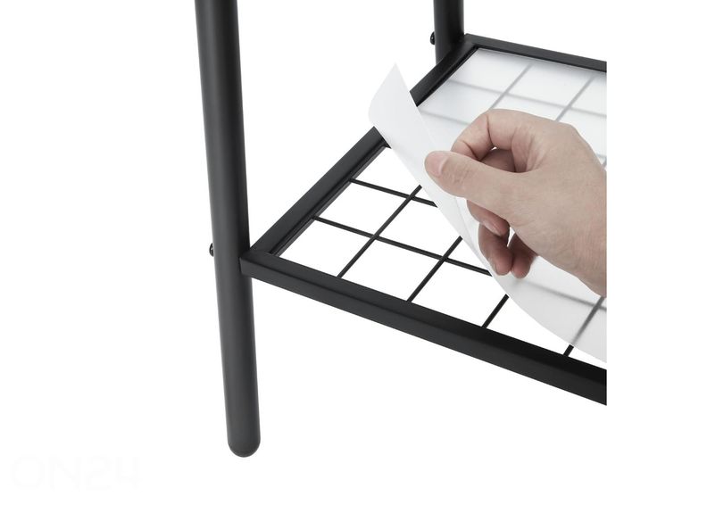 Vaaterekki, musta kuvasuurennos