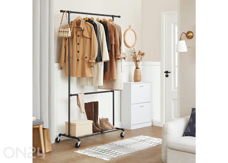 Vaaterekki pyörillä, musta kuvasuurennos