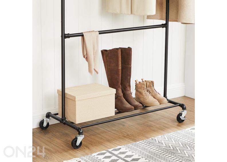 Vaaterekki pyörillä, musta kuvasuurennos